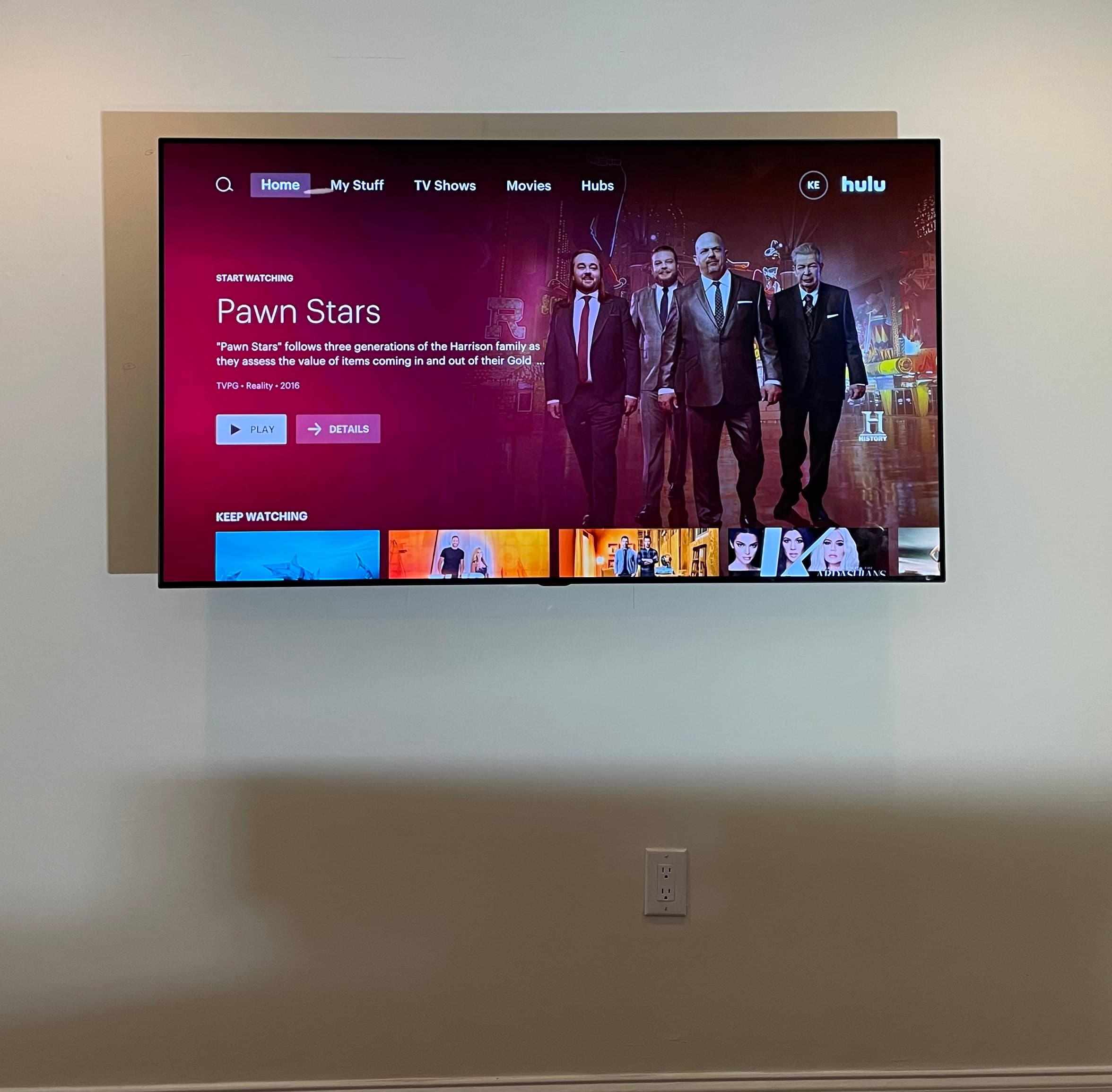 TV wall mount with fully concealed cords, no visible wiring, Tampa